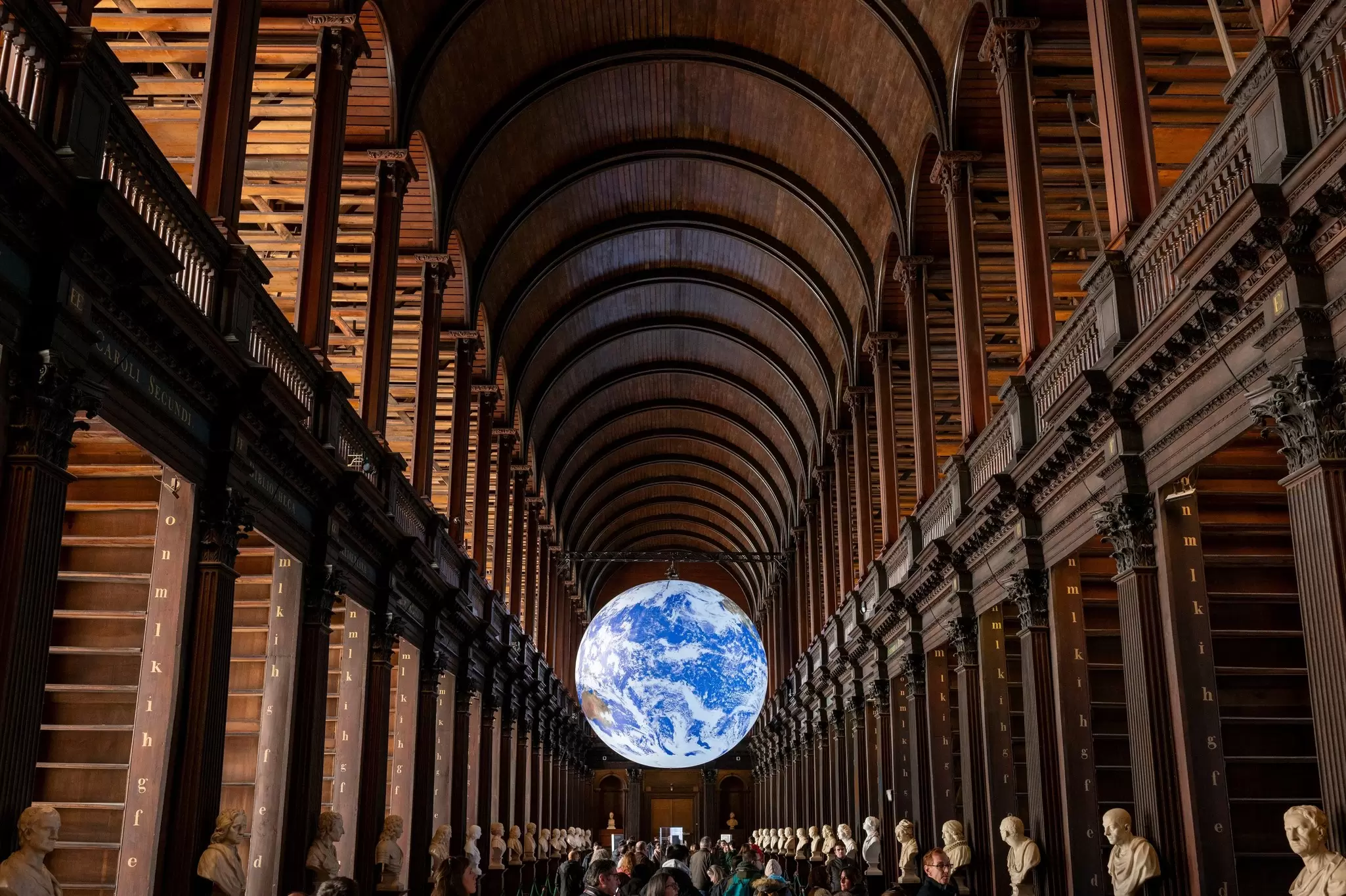 Dublin, Ireland. March, 1, 2025. Trinity College Library, which currently houses the stunning Gaia installation, a spectacular illuminated sculpture of the Earth created by Luke Jerram., License Type: media, Download Time: 2025-12-04T16:08:08.000Z, User: nic.dhoedt_lonelyplanet, Editorial: true, purchase_order: 56530 - Guidebooks, job: Global Publishing WIP , client: Lonely Planet Ireland 17, other: Nicolas D'Hoedt