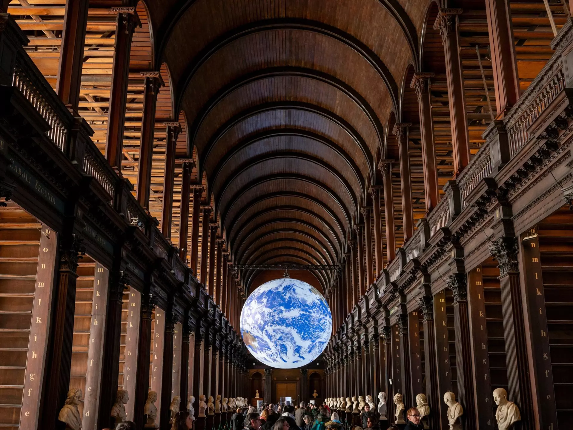 Dublin, Ireland. March, 1, 2025. Trinity College Library, which currently houses the stunning Gaia installation, a spectacular illuminated sculpture of the Earth created by Luke Jerram., License Type: media, Download Time: 2025-12-04T16:08:08.000Z, User: nic.dhoedt_lonelyplanet, Editorial: true, purchase_order: 56530 - Guidebooks, job: Global Publishing WIP , client: Lonely Planet Ireland 17, other: Nicolas D'Hoedt