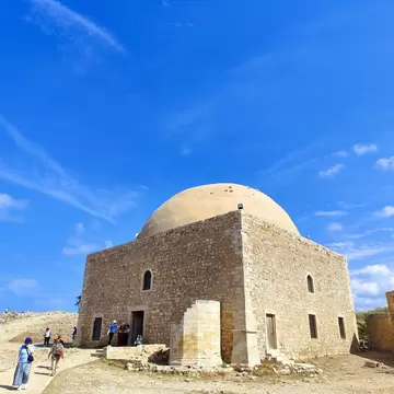 A group of tourists exits the Ibrahim Khan Mosque in Fortezza Fortress in Rethymno, Crete.