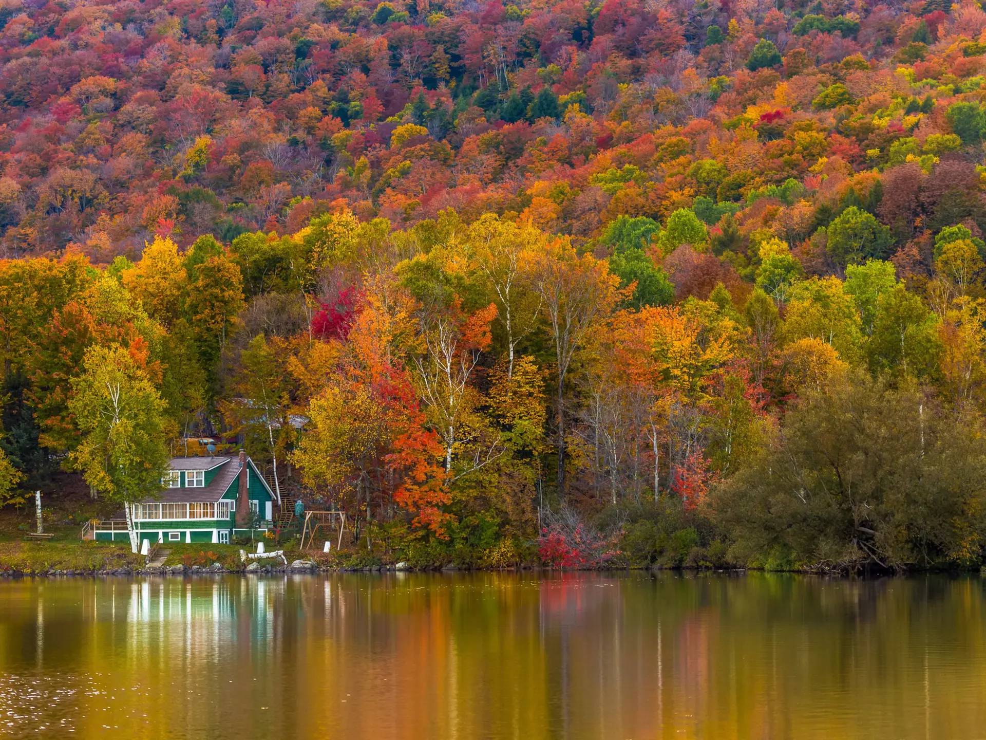 Autumn foliage and reflection in Vermont, Elmore state park.  License Type: media  Download Time: 2021-09-07T15:26:55.000Z  User: zachary.laks_lonelyplanet  Is Editorial: No  purchase_order:   
