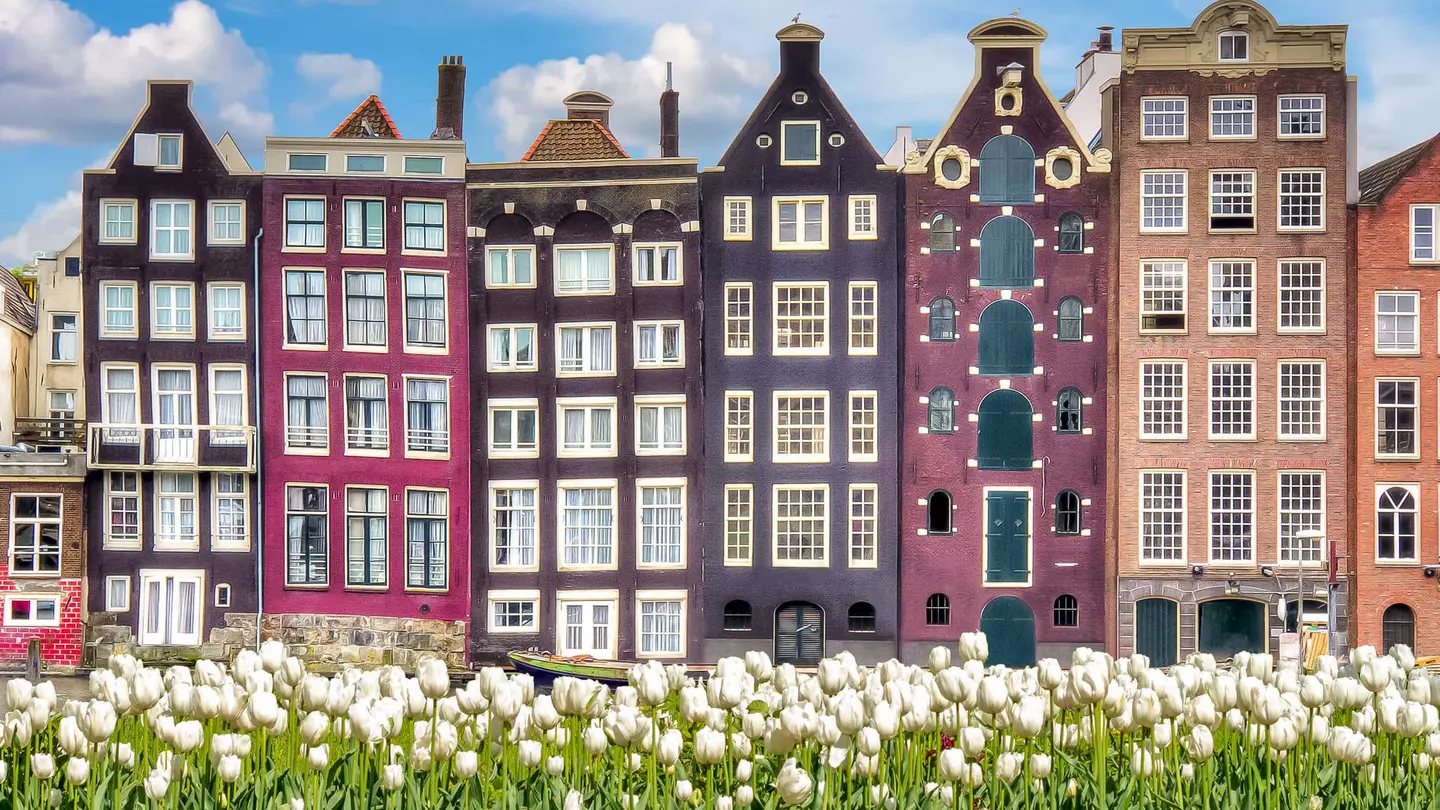 Admiring the incredible gardens and architecture of Amsterdam doesn't cost a cent. Vladislav Zolotov / Getty Images