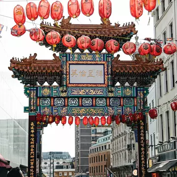 A busy Carnaby Street in Central London on a hot sunny summer's day.  