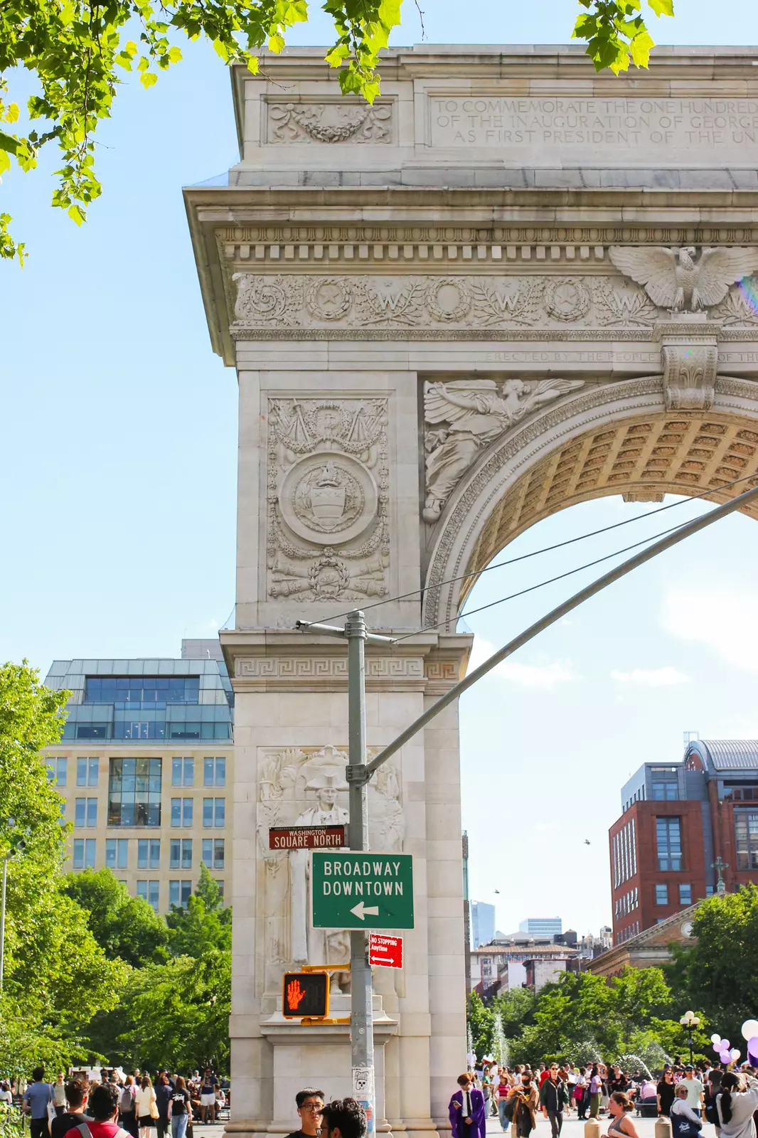 The stone arch at Washington Square Park in New York City, with a fountain in the background
