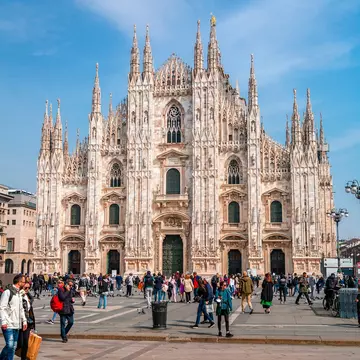 Crowds of tourists outside the Milan Cathedral.