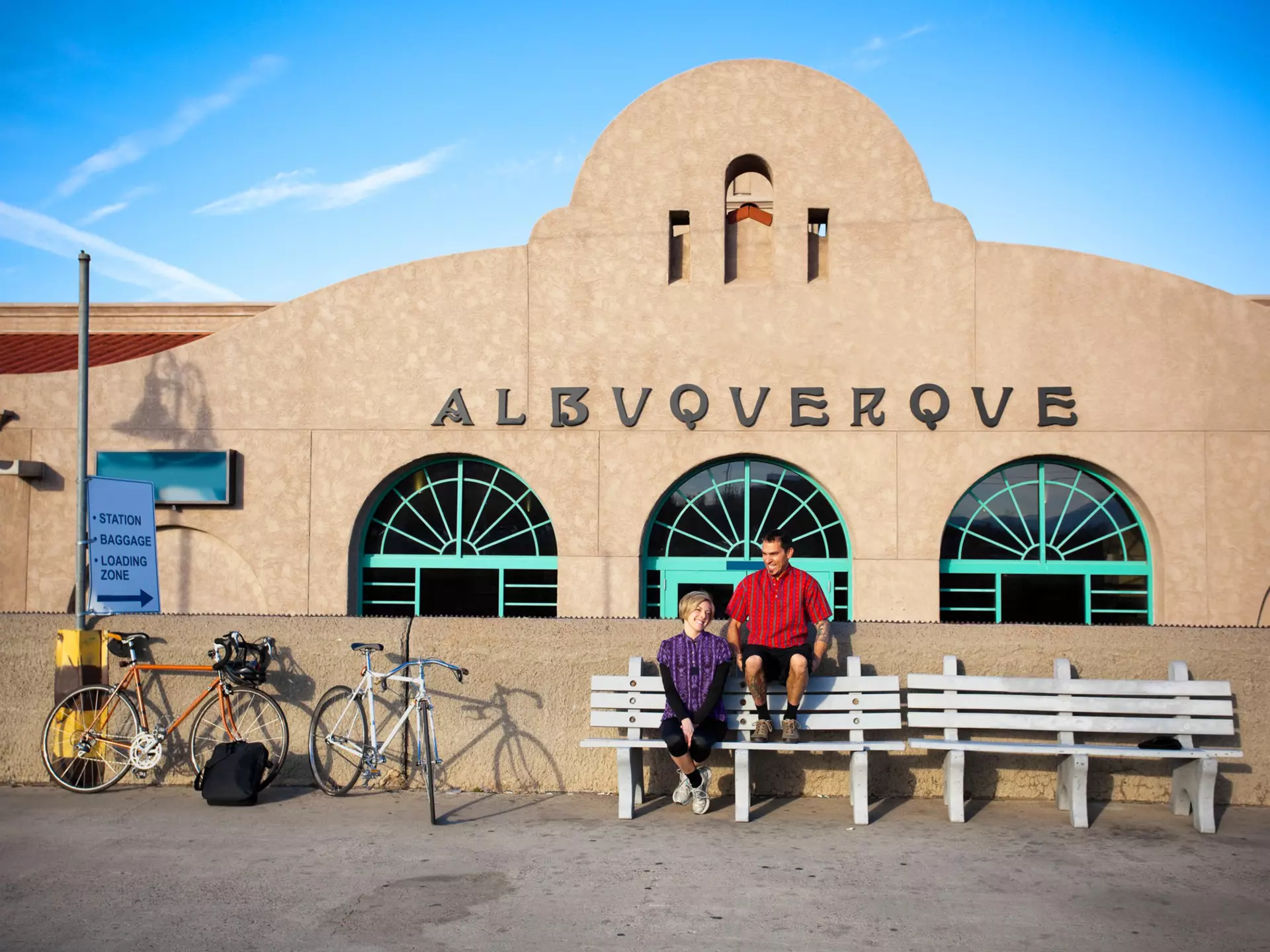 A pair of cyclists take a break in Albuquerque
