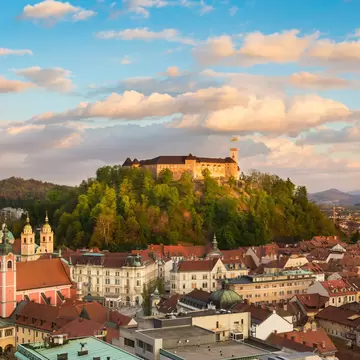 Panorama of the Slovenian capital Ljubljana at sunset.; Shutterstock ID 186963659; Your name (First / Last): Josh Vogel; Project no. or GL code: 56530; Network activity no. or Cost Centre: Online-Design; Product or Project: 65050/7529/Josh Vogel/L...