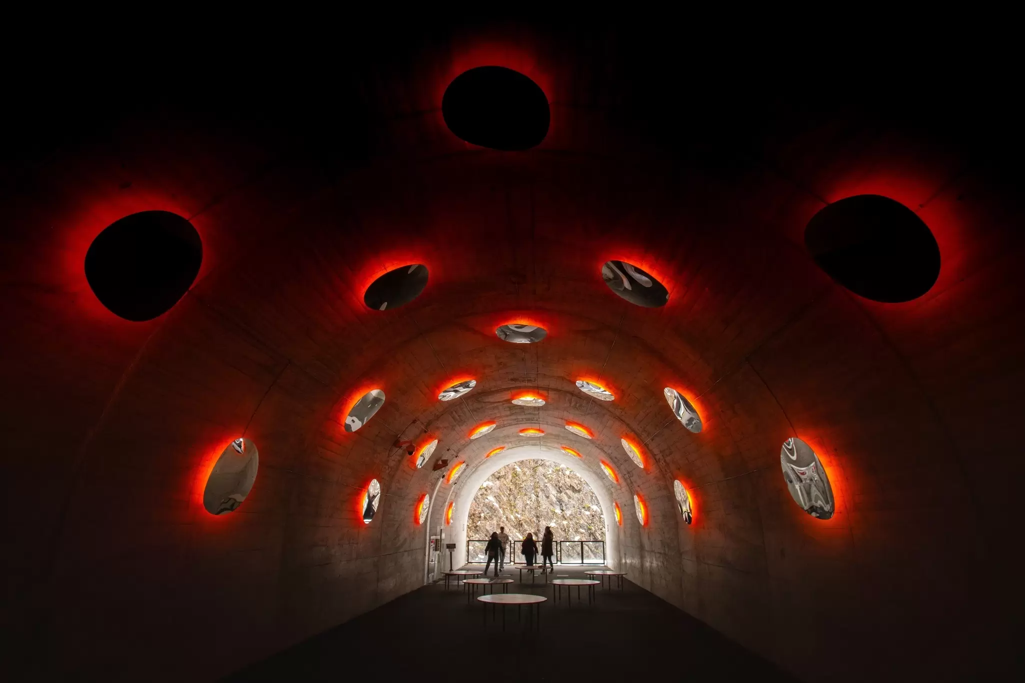 People walk in a tunnel illuminated with an art installation, Kiyotsu Gorge Tunnel, Tokamachi, Niigata