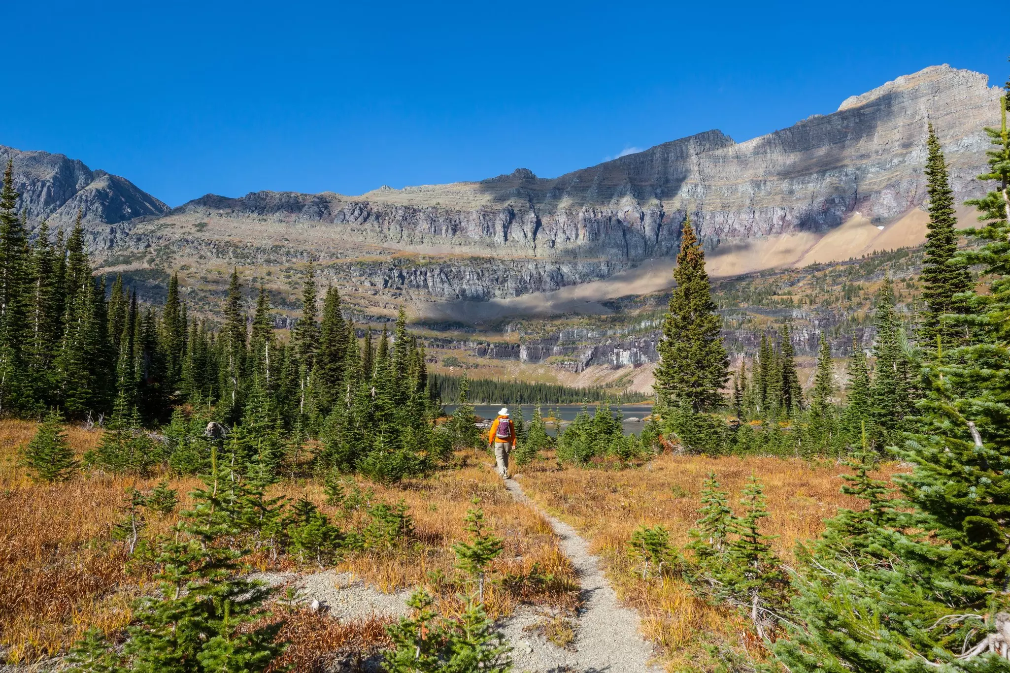 Picturesque rocky peaks of the Glacier National Park, Montana, USA. Autumn season. Beautiful natural landscapes.