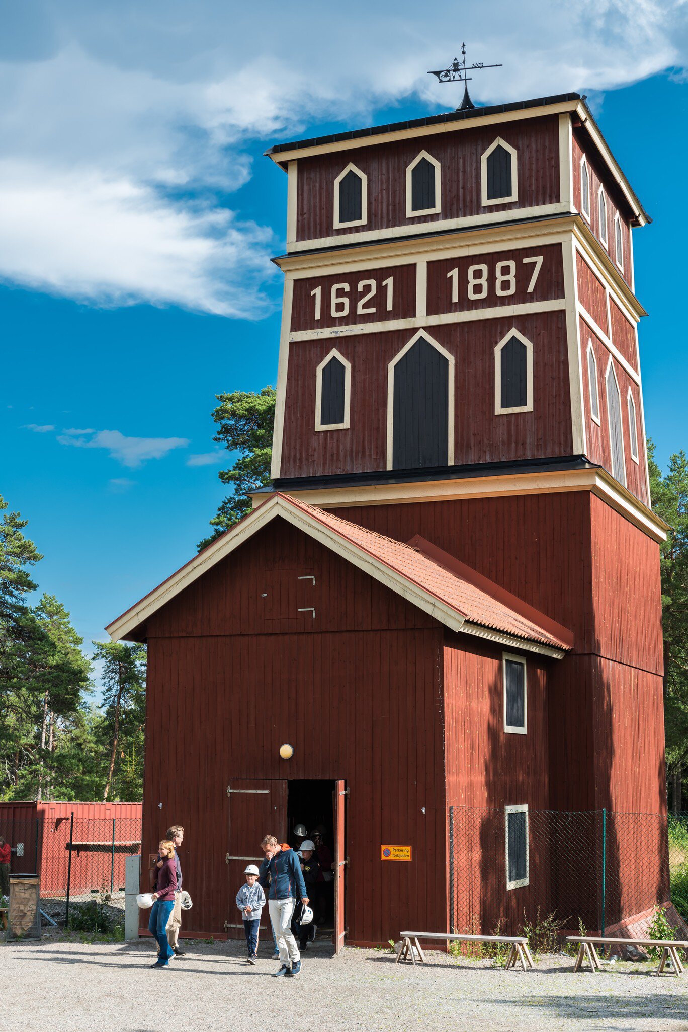 Sala, Sweden- July 24, 2019: Rural outdoor view of the historic and famous Queen Christinas shaft building at Sala silver mine with incidental people in Sala Sweden July 24, 2019.