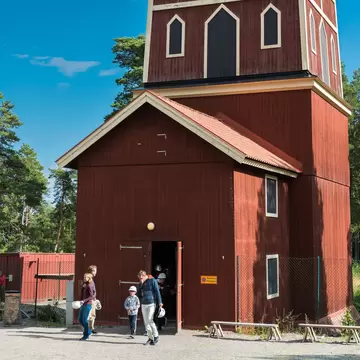 Sala, Sweden- July 24, 2019: Rural outdoor view of the historic and famous Queen Christinas shaft building at Sala silver mine with incidental people in Sala Sweden July 24, 2019.