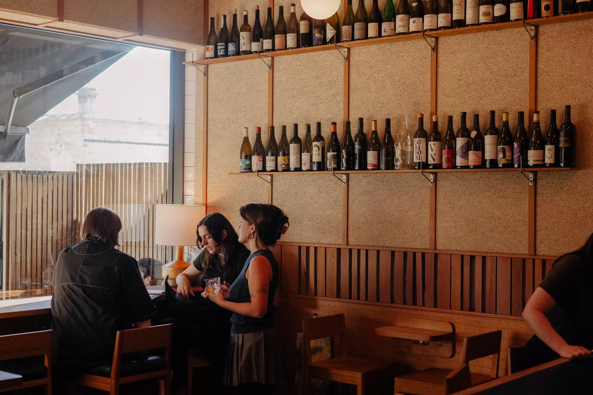 A group of friends at a wine bar in Brunswick, Melbourne