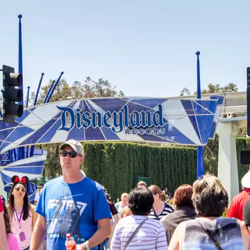 Anaheim, California/United States - 04/24/2019: Tourist walk across the street towards Disneyland theme park  License Type: media  Download Time: 2023-05-20T07:55:07.000Z  User: claramonitto  Is Editorial: Yes  purchase_order:   