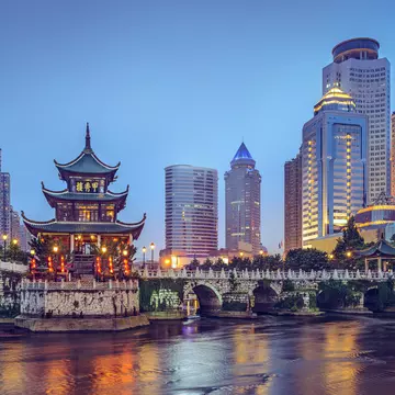 The colorful Guiyang, China, skyline at Jiaxiu Pavilion on the Nanming River.