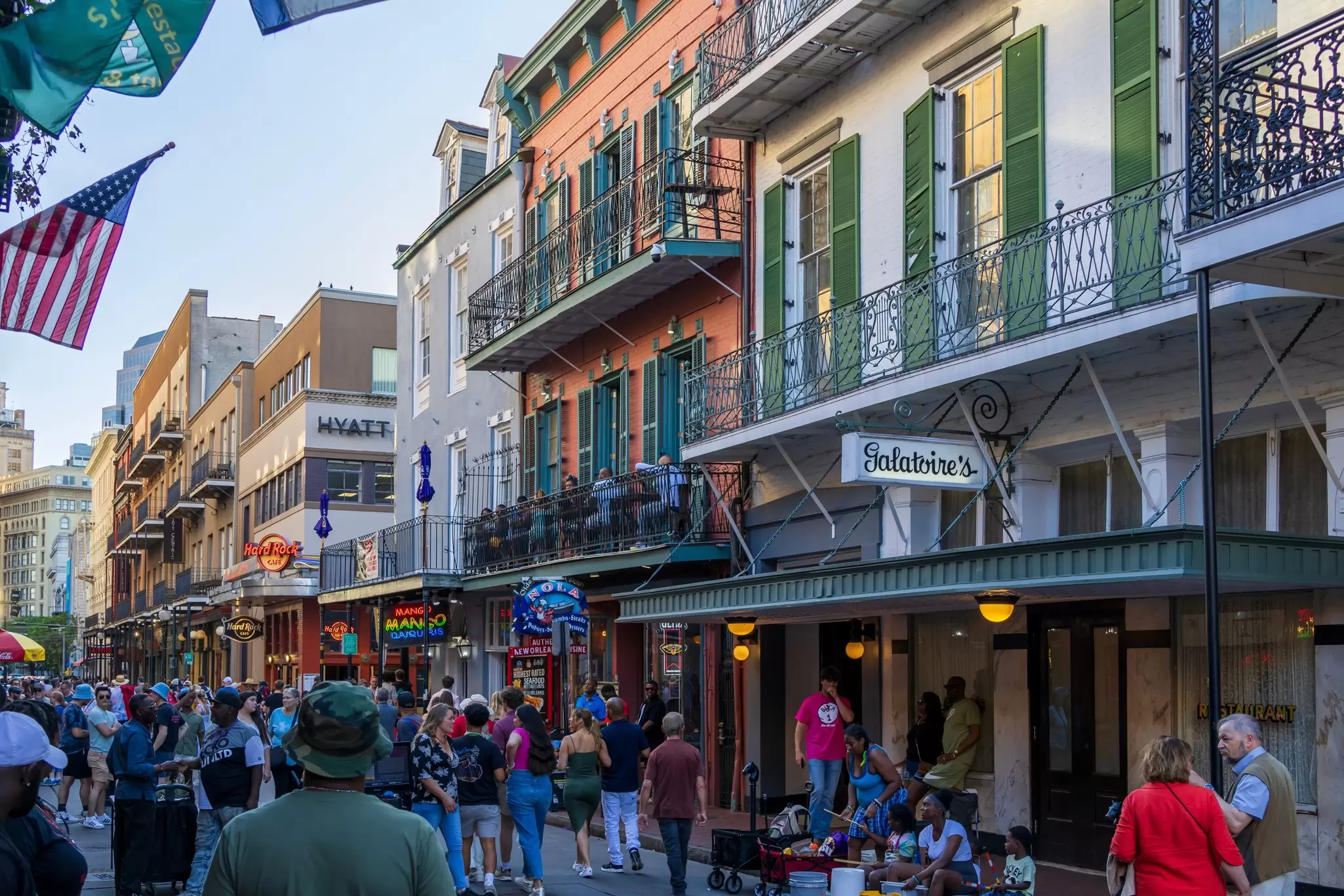 Restaurants and bars along busy Bourbon Street in New Orleans. Marcus E Jones/Shutterstock