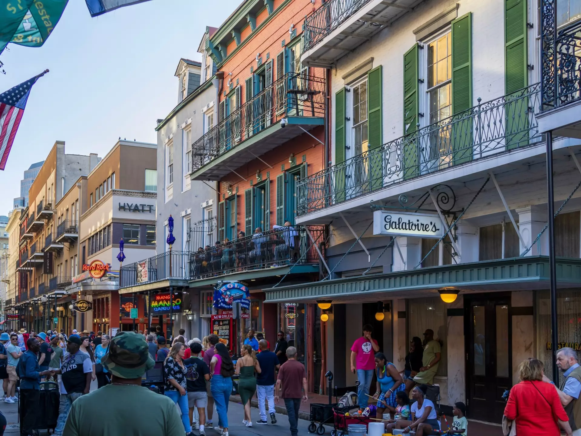 Restaurants and bars along busy Bourbon Street in New Orleans. Marcus E Jones/Shutterstock