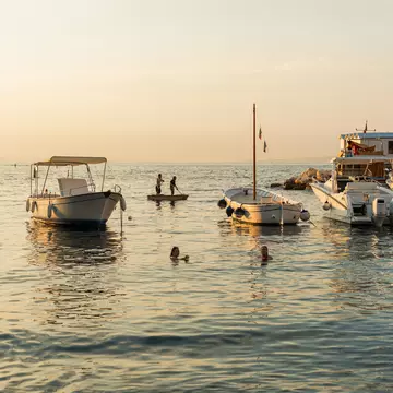 Swimmers at Marina Grande in Sorrento on the Amalfi Coast. Alexis Doyle for Lonely Planet