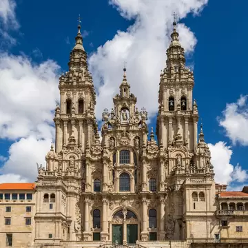 View of the facade of the Catedral de Santiago de Compostela on the Praza do Obradoiro in Spain.