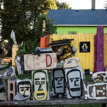 DETROIT, MI - SEPTEMBER 03:  A sculpture created from recycled material sits amongst the "Heidelberg project," which is an "open air art environment" centered around one block in Detroit, on September 3, 2013 in Detroit, Michigan. The Heidelberg p...