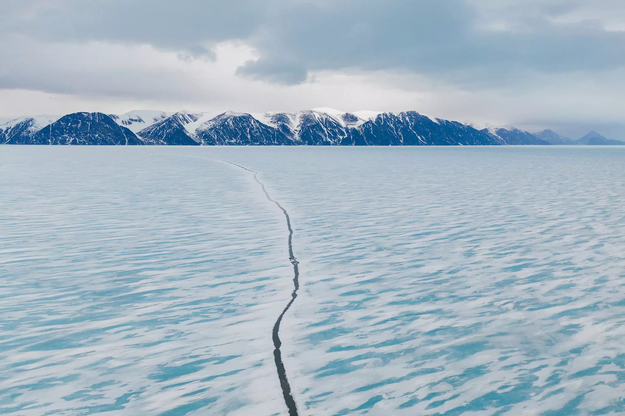 Melting ice near Sirmilik National Park on Bylot Island, Nunavut, Canada.