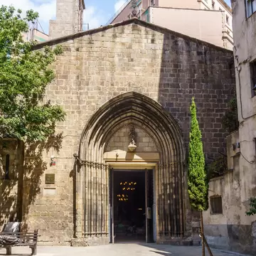 View of the ornate entrance to the Església de Santa Anna in Barcelona, Spain.
