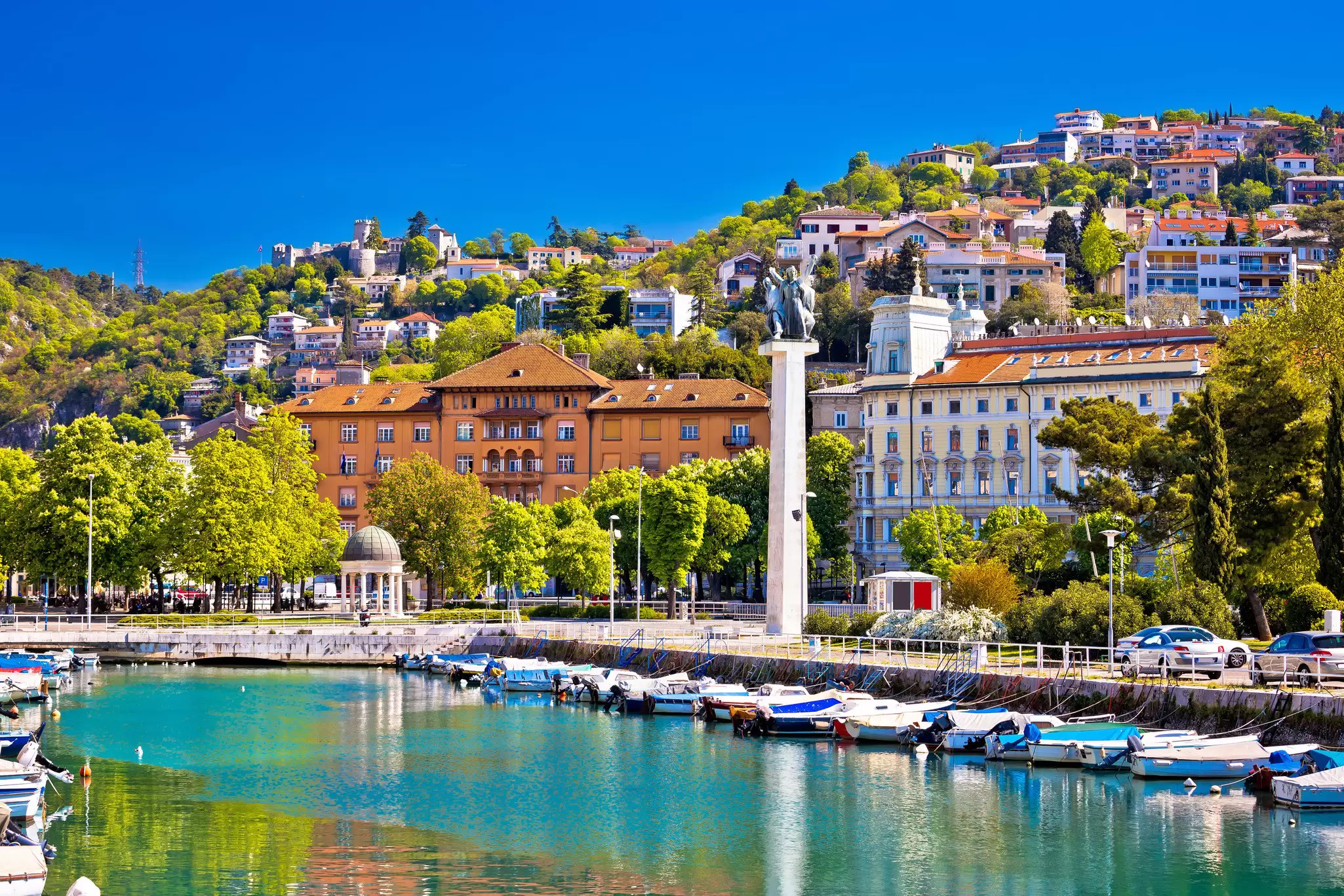 Boats moored on the waterfront of Rijeka.
628366313
adriatic, ancient, architecture, bay, blue, central, church, city, cityscape, coast, colorful, croatia, croatian, dalmatian, delta, destination, europe, fiume, harbor, historic, kvarner, landmark, marine, mediterranean, ocean, palace, panorama, panoramic, rijeka, river. rjecina, rock, sanctuary, sea, skyscraper, square, street, tourism, tourist, tower, town, trsat, turquoise, vacation, view, water, waterfront, yacht