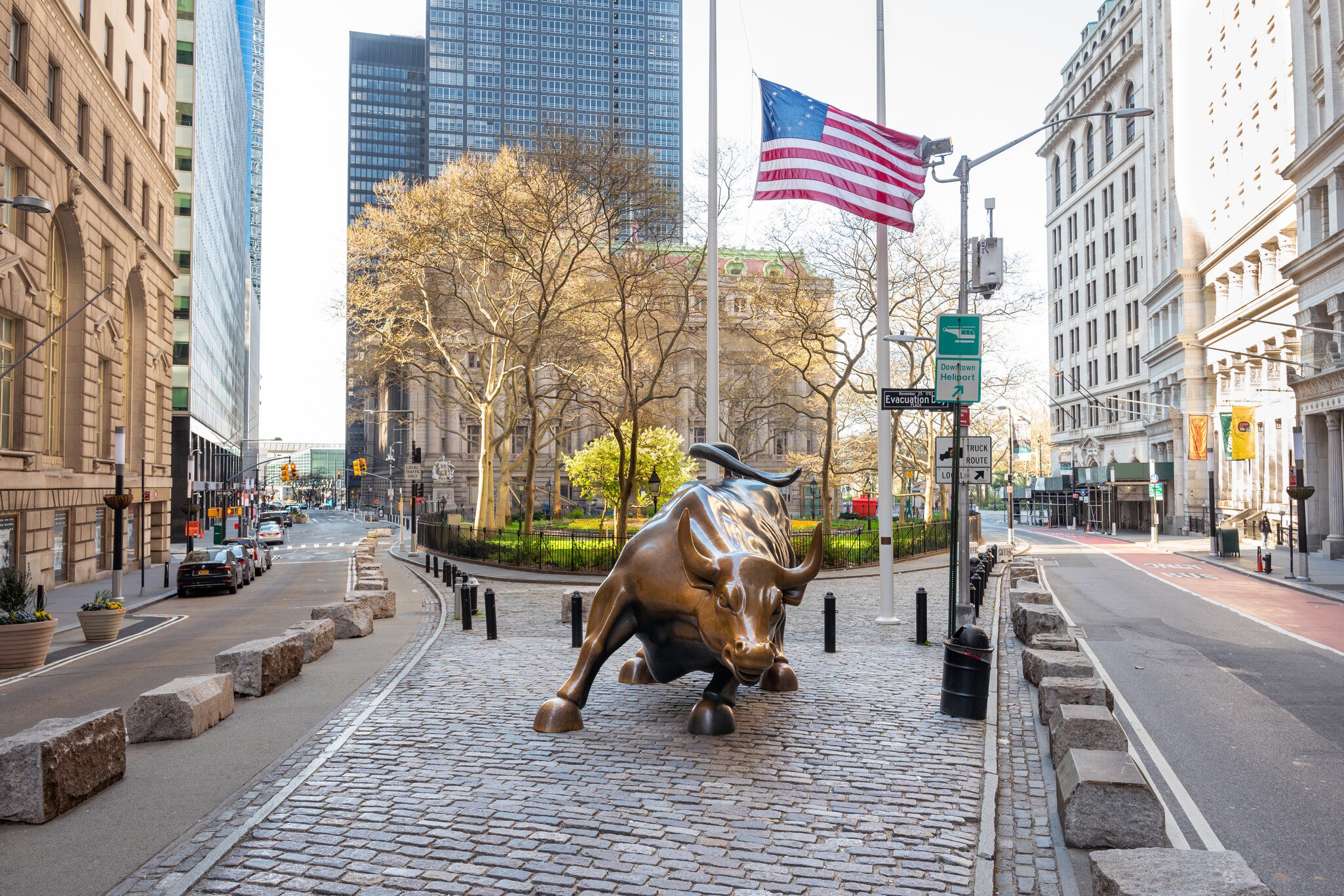 New York, NY - April 19, 2020: 'Charging Bull' bronze sculpture located in Bowling Green area of Wall Street Financial district in Manhattan., License Type: media, Download Time: 2026-04-09T14:49:08.000Z, User: LP_KChen, Editorial: true, purchase_order: 65050 - Digital Destinations and Articles, job: Lonely Planet, client: WIP App Content, other: Karen Chen
