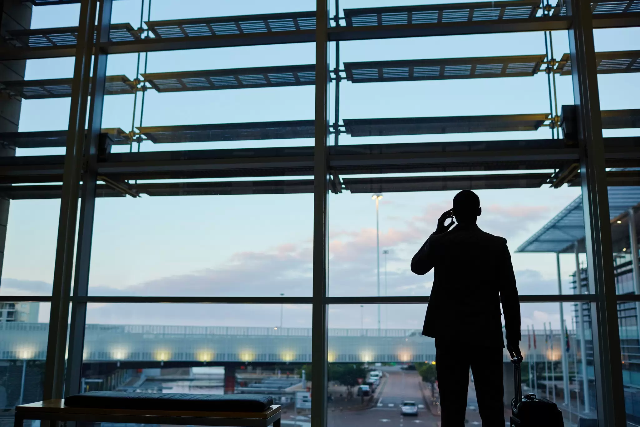 Travelers at a destination observing health and safety measures