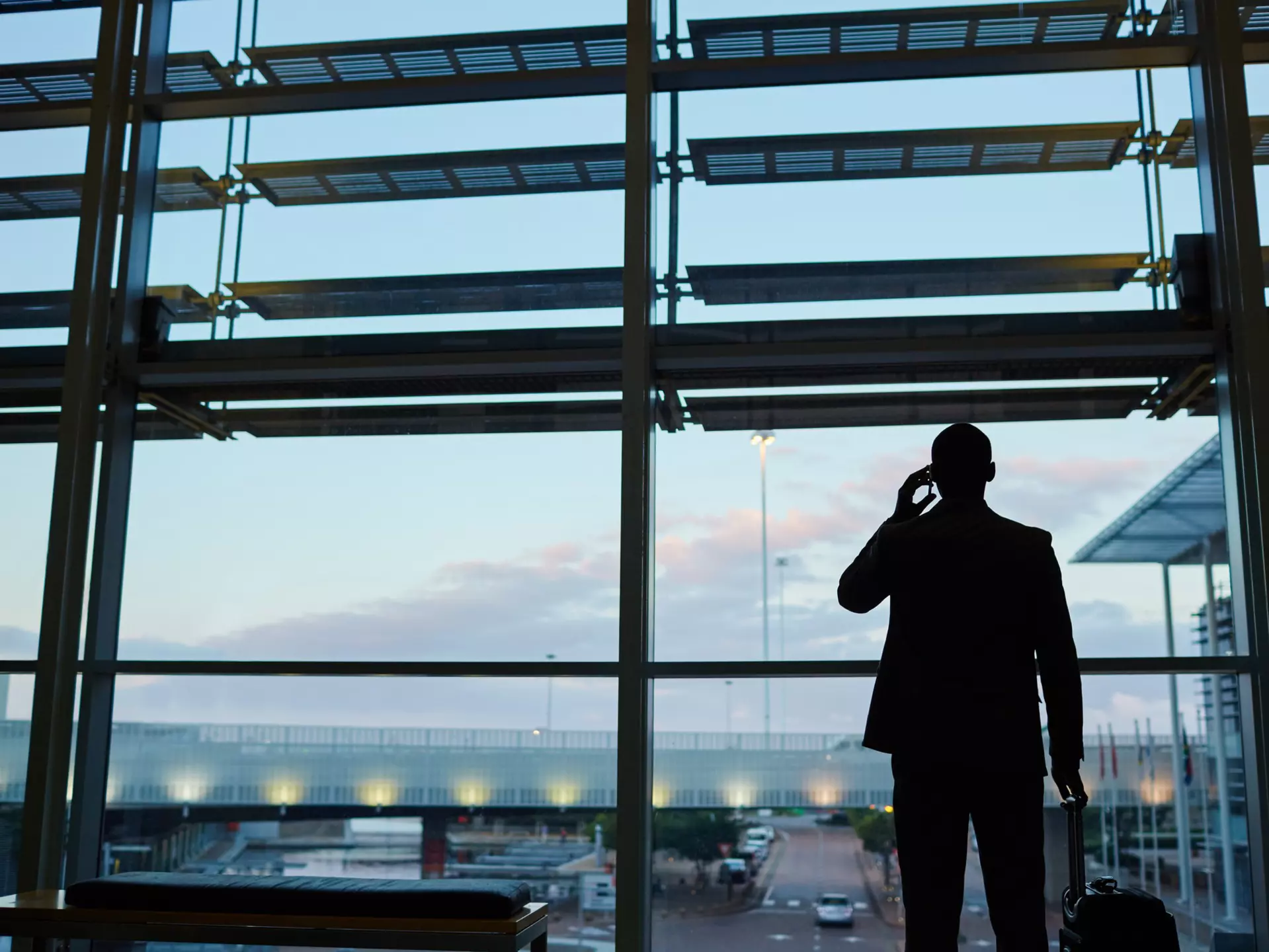Travelers at a destination observing health and safety measures