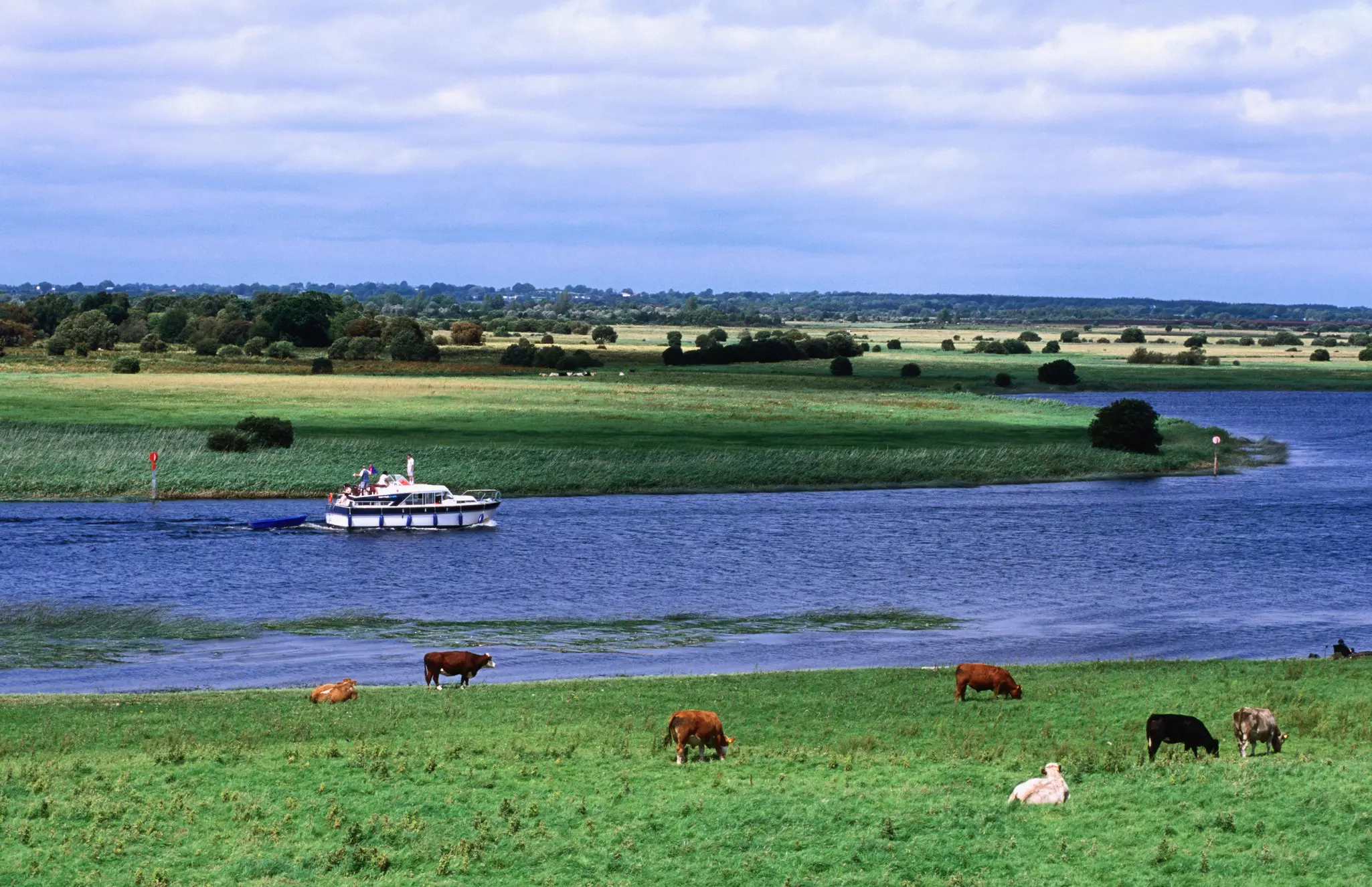 Aboard a private boat on the River Shannon, you’ll float through the heart of rural Ireland © Holger Leue / Getty Images