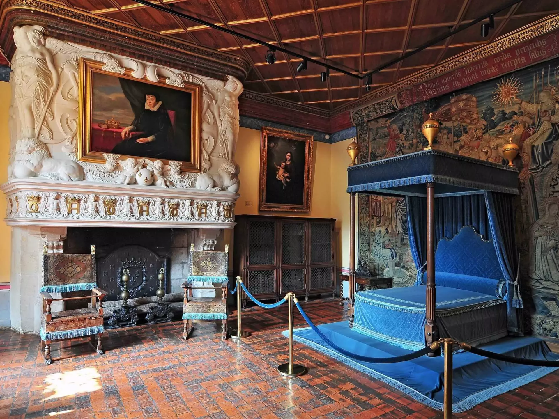 Four-poster bed in a luxury guest bedroom at Law Castle