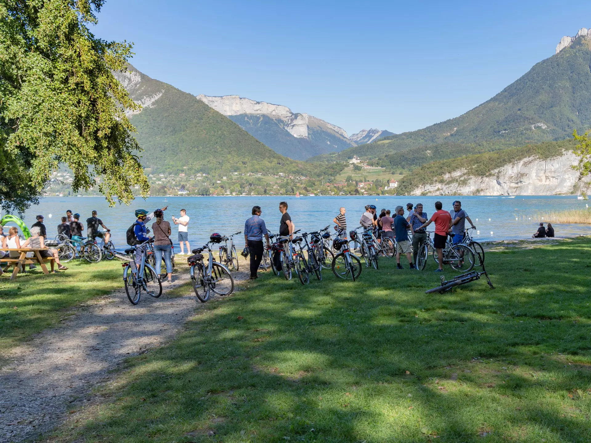Cyclists by Lake Annecy. Tobias Joon-Ho Persson/Shutterstock