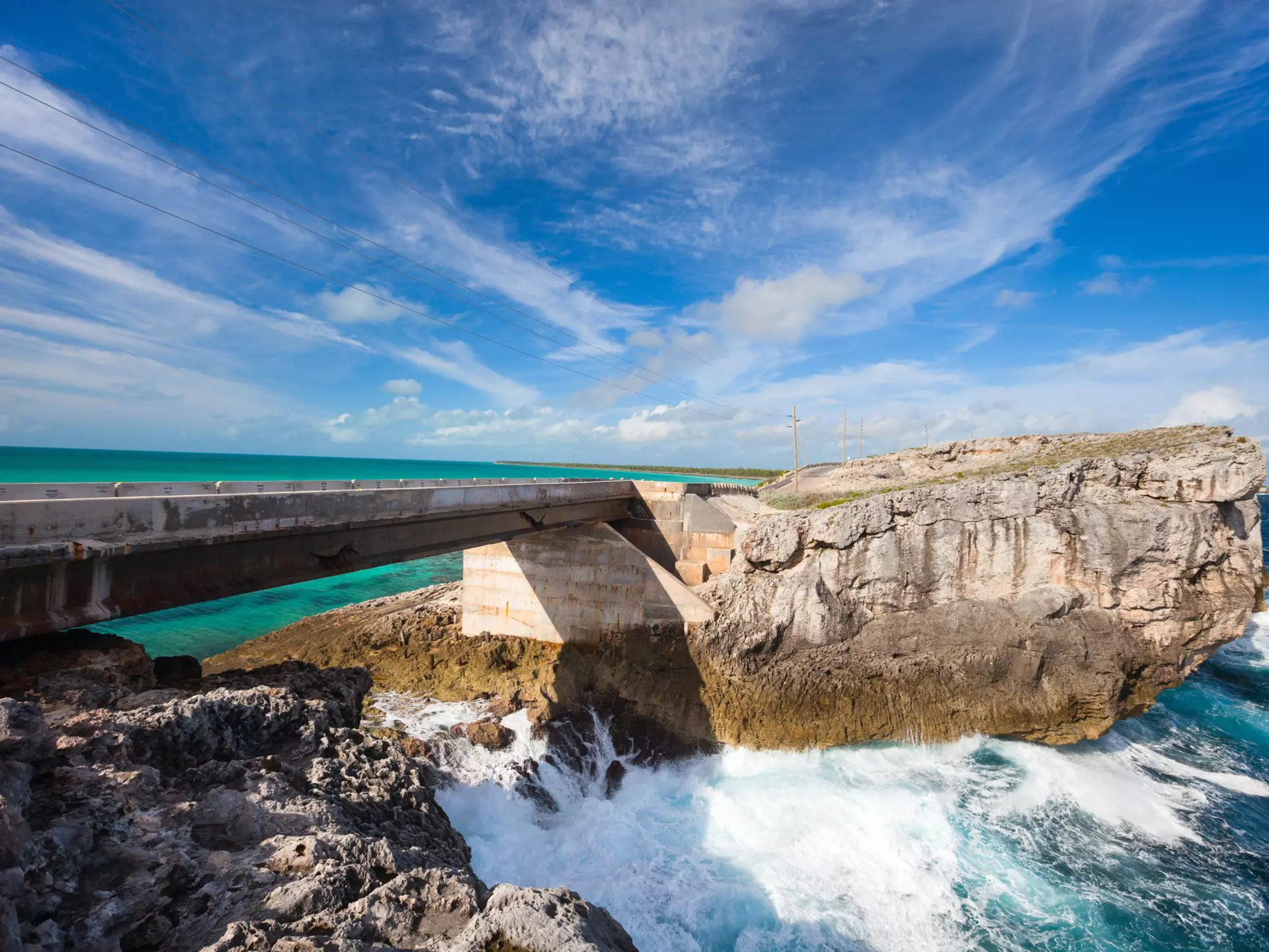 Glass window bridge on Eleuthera island, where the Caribbean sea meets the Atlantic ocean.
