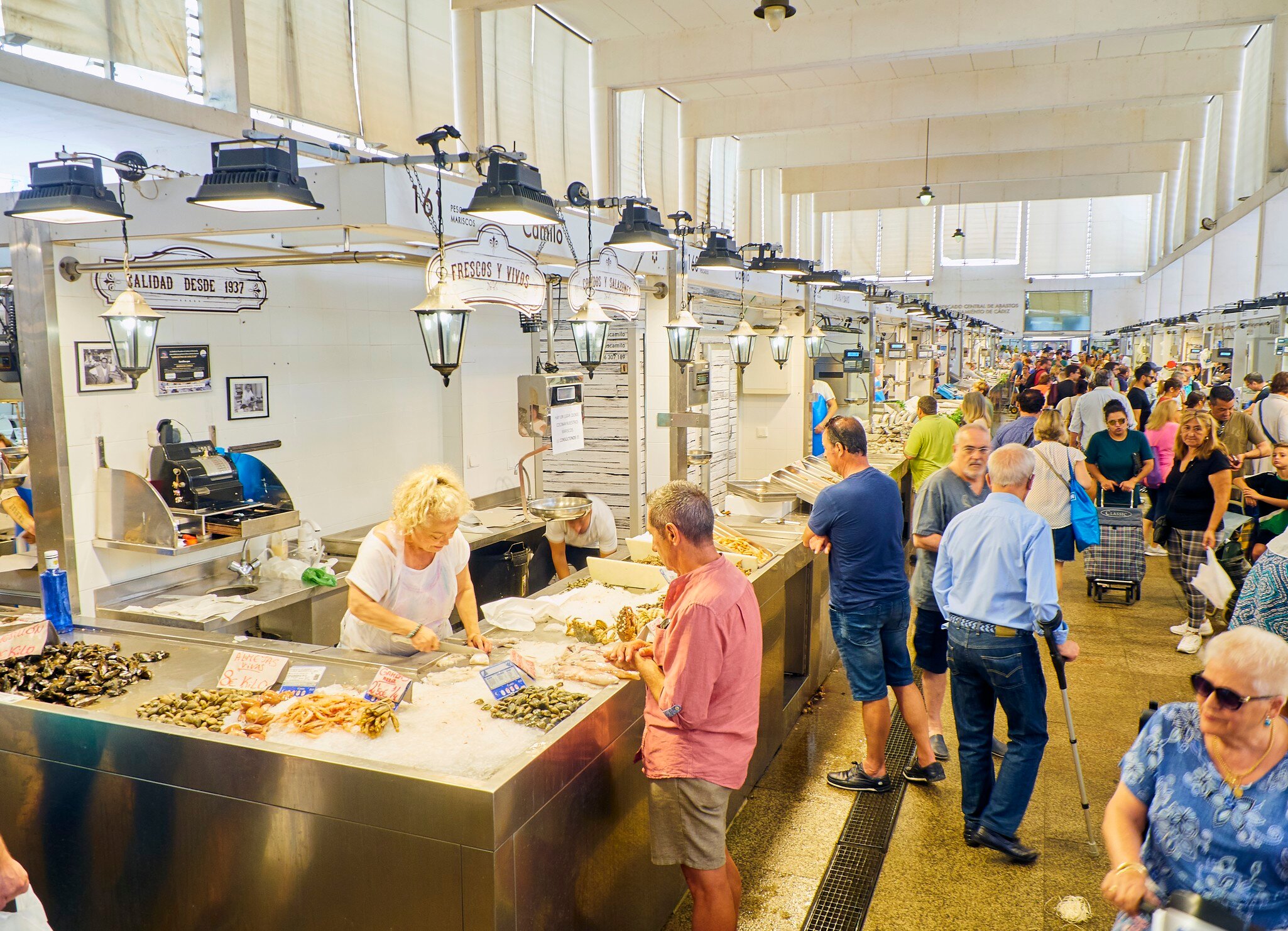 Cadiz, Spain - June 22, 2019. Citizens shopping in Cadiz downtown Market, Mercado Central de Abastos. Cadiz, Andalusia, Spain.