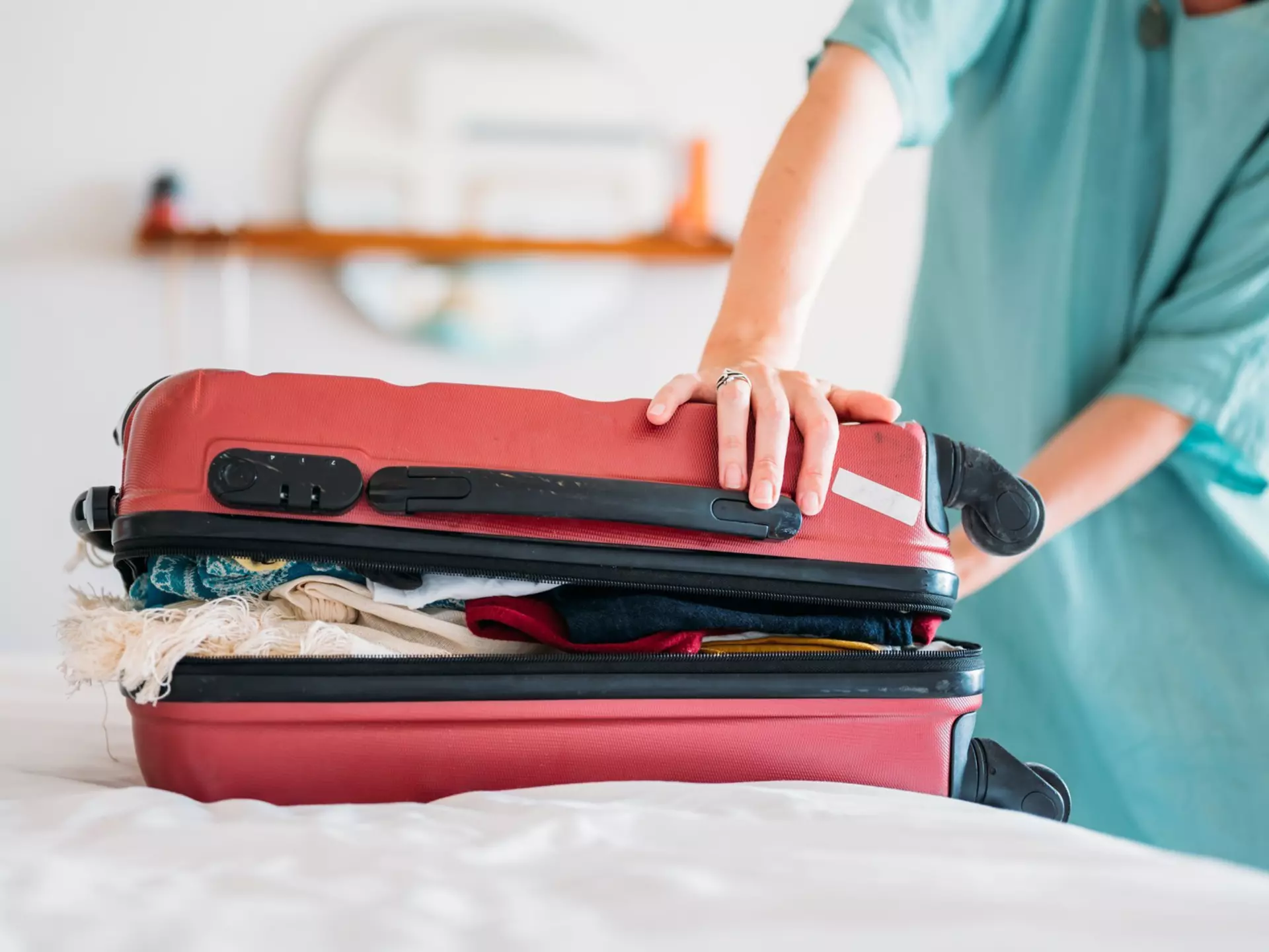 Here's how to pack a small bag for a long trip. Pyrosky/Getty Images