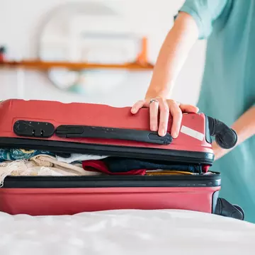 Here's how to pack a small bag for a long trip. Pyrosky/Getty Images