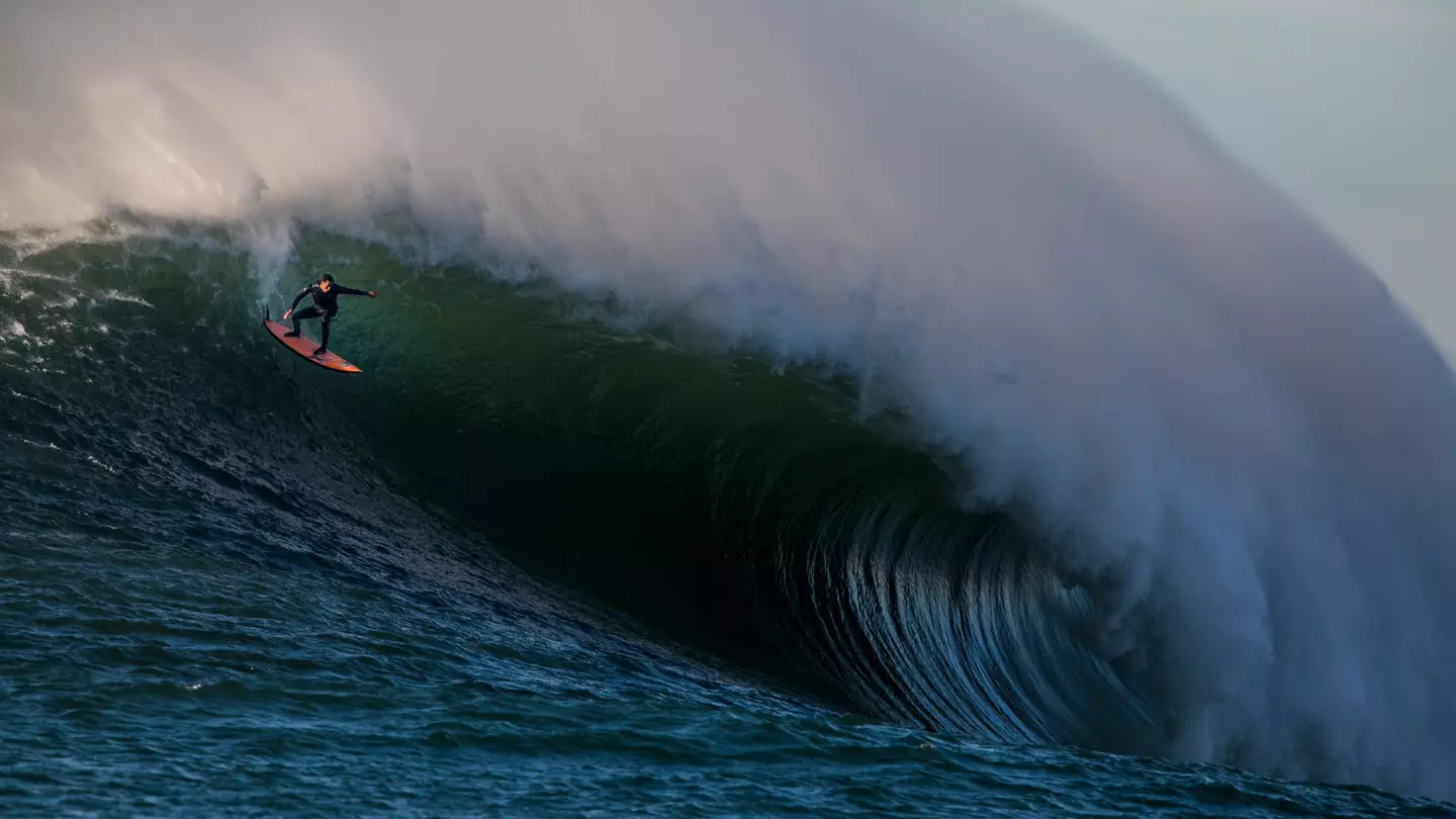 shuttSurfers ride massive waves at Mavericks, a surf break south of San Francisco in California