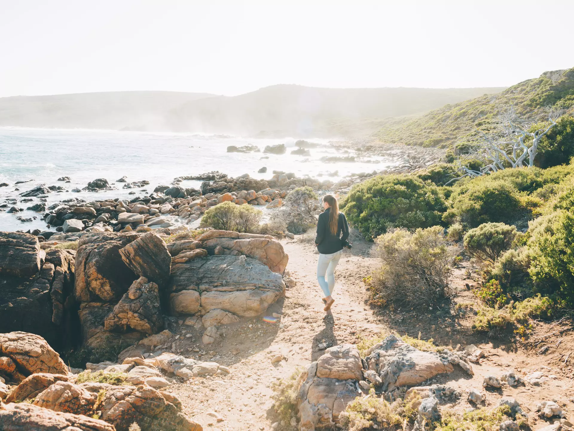 Female hiker on a coastal trail near Cape Naturaliste