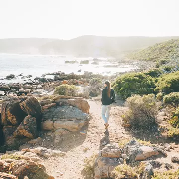 Female hiker on a coastal trail near Cape Naturaliste