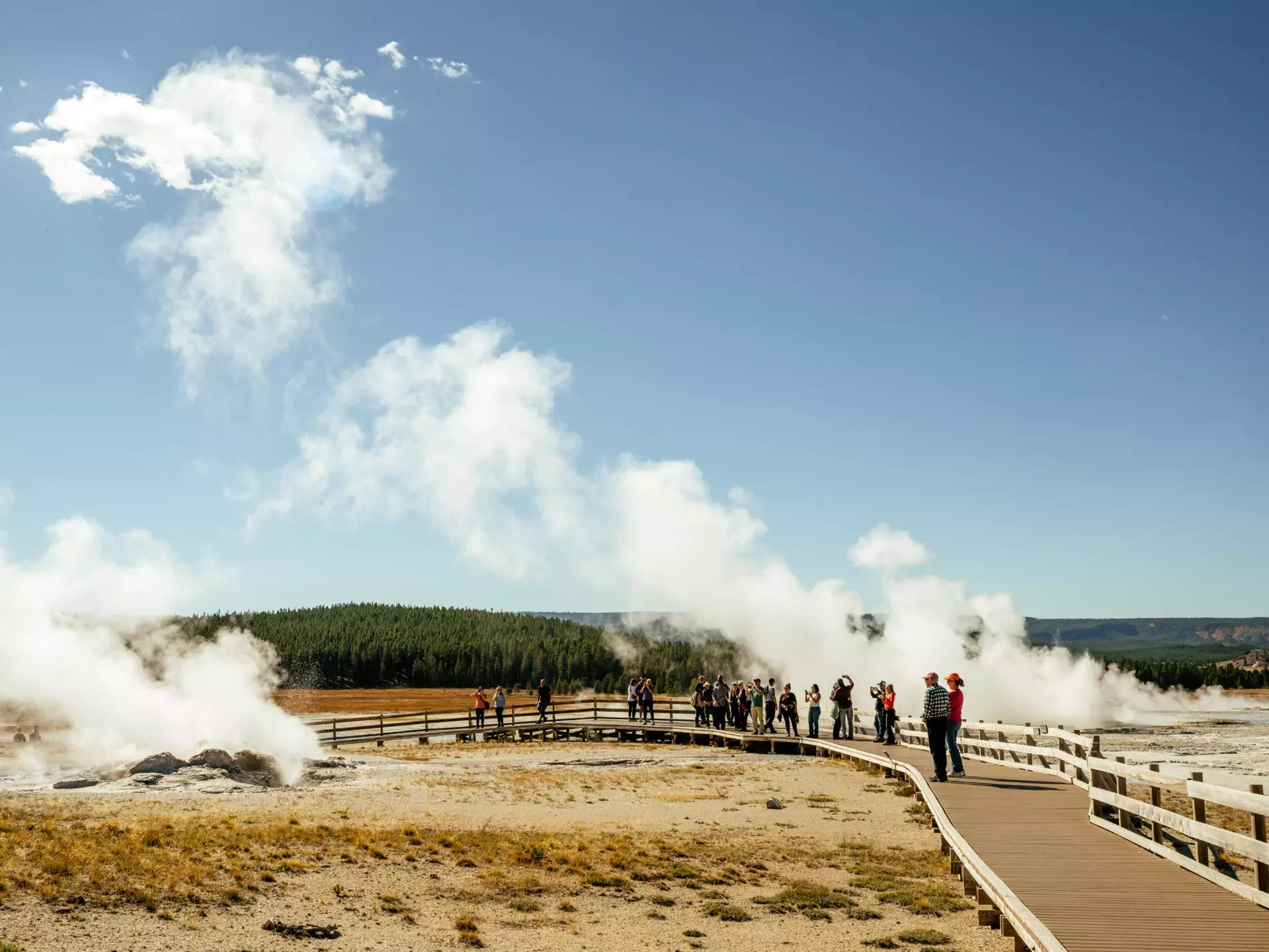Boardwalk views of Jet geyser and Fountain geyser in Yellowstone National Park, Wyoming. Septemeber 2025.