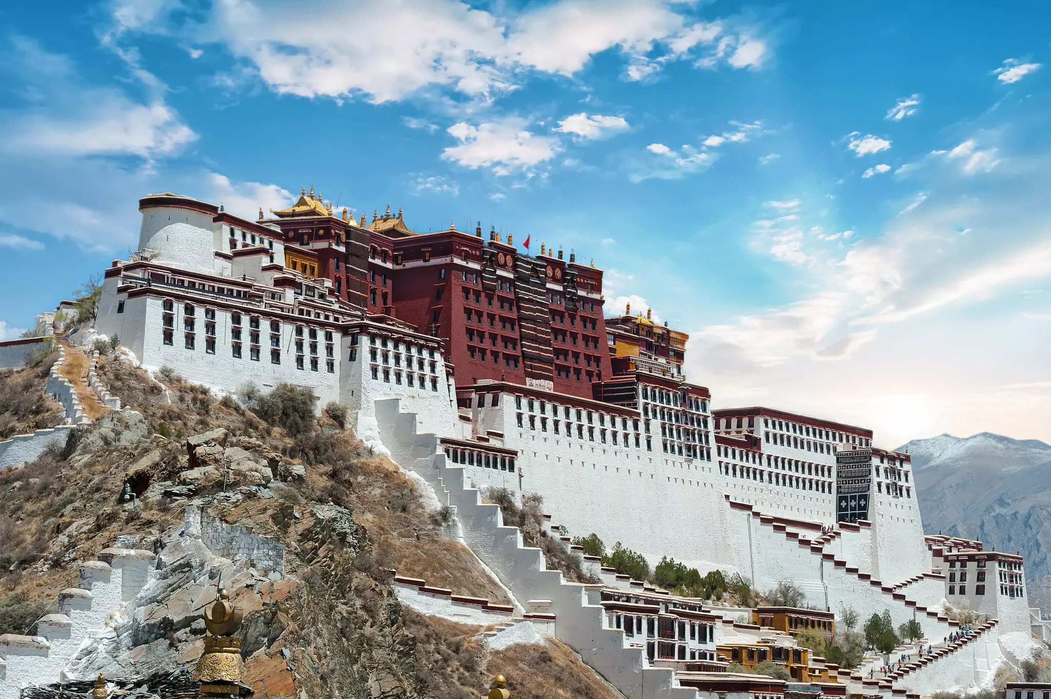 Exterior of Potala Palace monastery in Lhasa on a sunny day.
