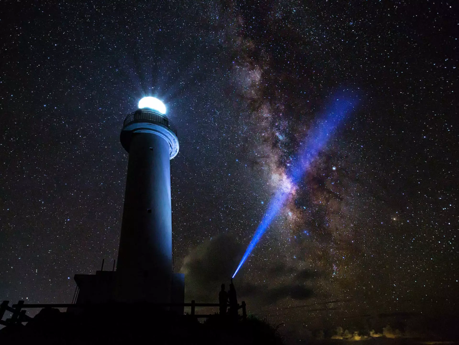 The Milky Way on a clear night with the Uganzaki Lighthouse in the foreground and a laser light shining up into the sky
KG6K0C
Celestial, Night, planet, Earth, star, Sky, Stars, starlight, starry, astrophotograph, Cosmos, Cosmic, Galaxy, Island, tropical island, Scenic View, View, Natural, Tropical, subtropical, Travel, Vacation, Tourism, tranquil, Peaceful, Serene, harmony, Relaxing, Silhouette, Romantic, Okinawa, Sakieda peninsula, Summer, clear weather