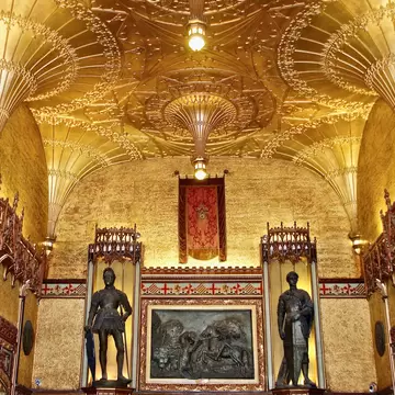 Ornate gold interior and statues inside the State Theatre in Sydney, Australia.