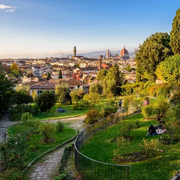 A little park in Florence, Tuscany, with the cityscape in background.