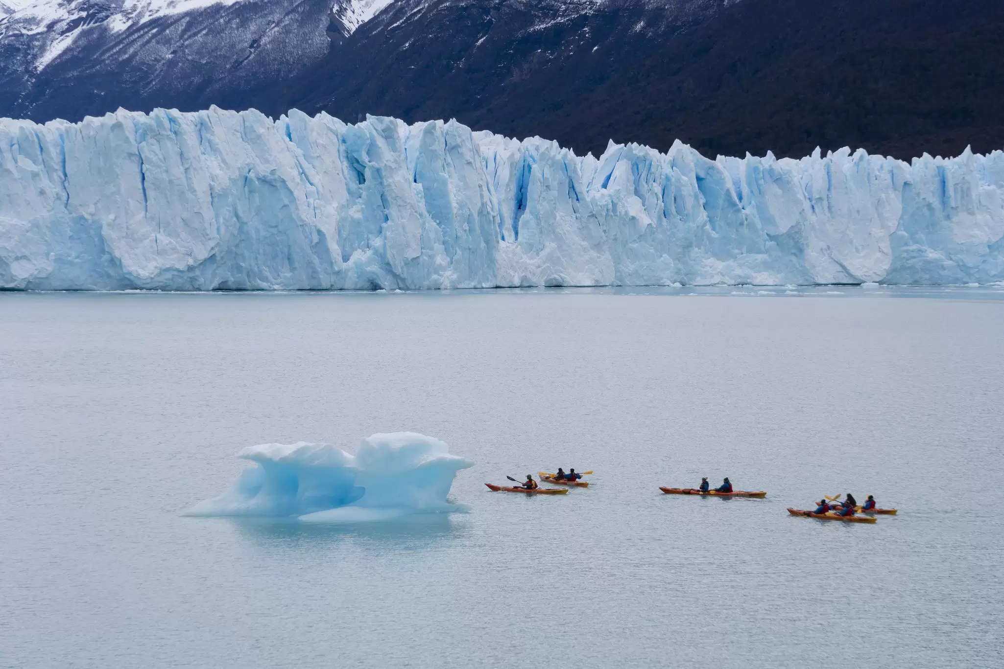 Kayakers paddle near the Perito Moreno Glacier in the Los Glaciares National Park, Argentina.