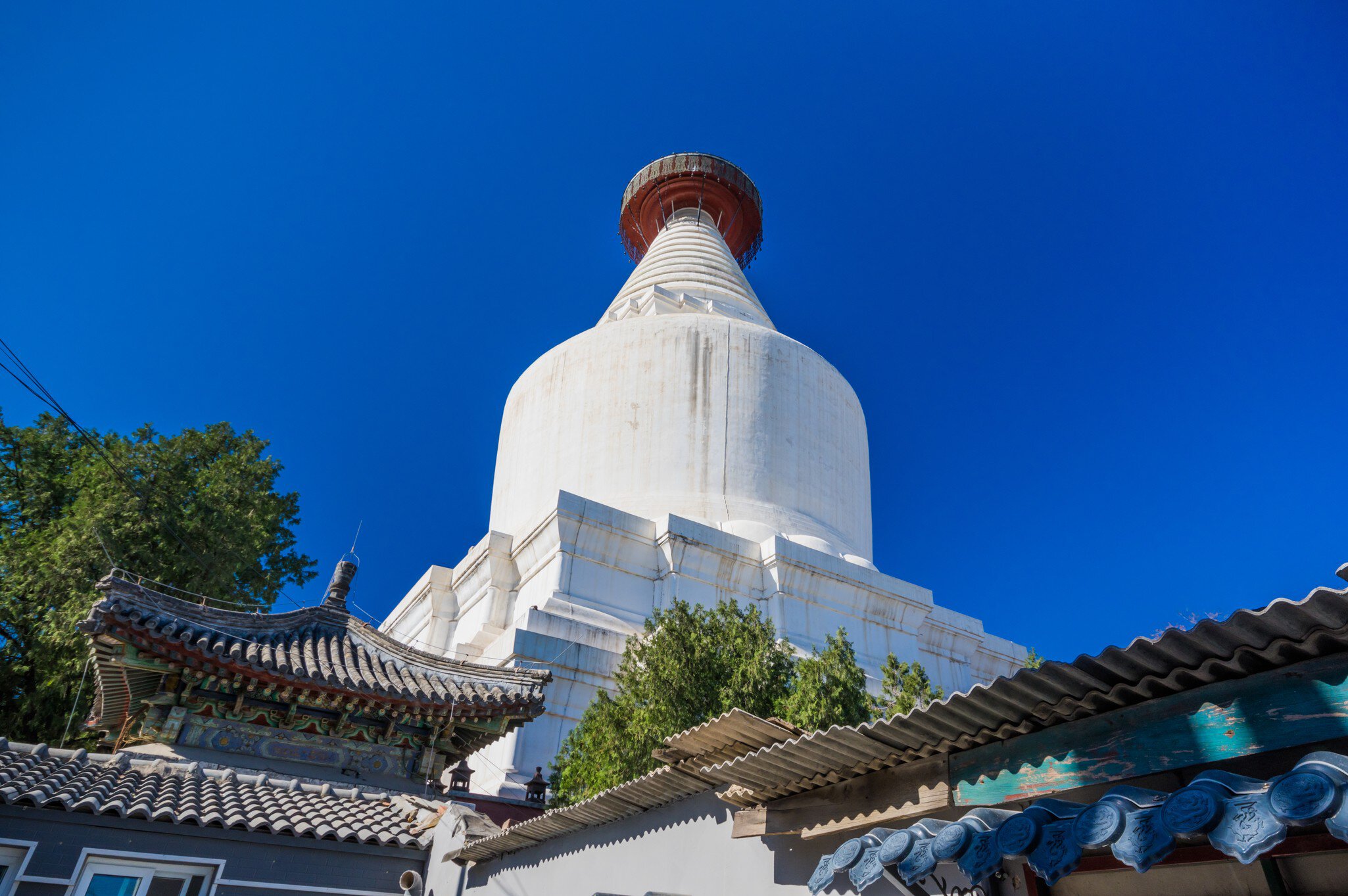 Beijing Miaoying Temple Baita Temple White Pagoda against a blue sky