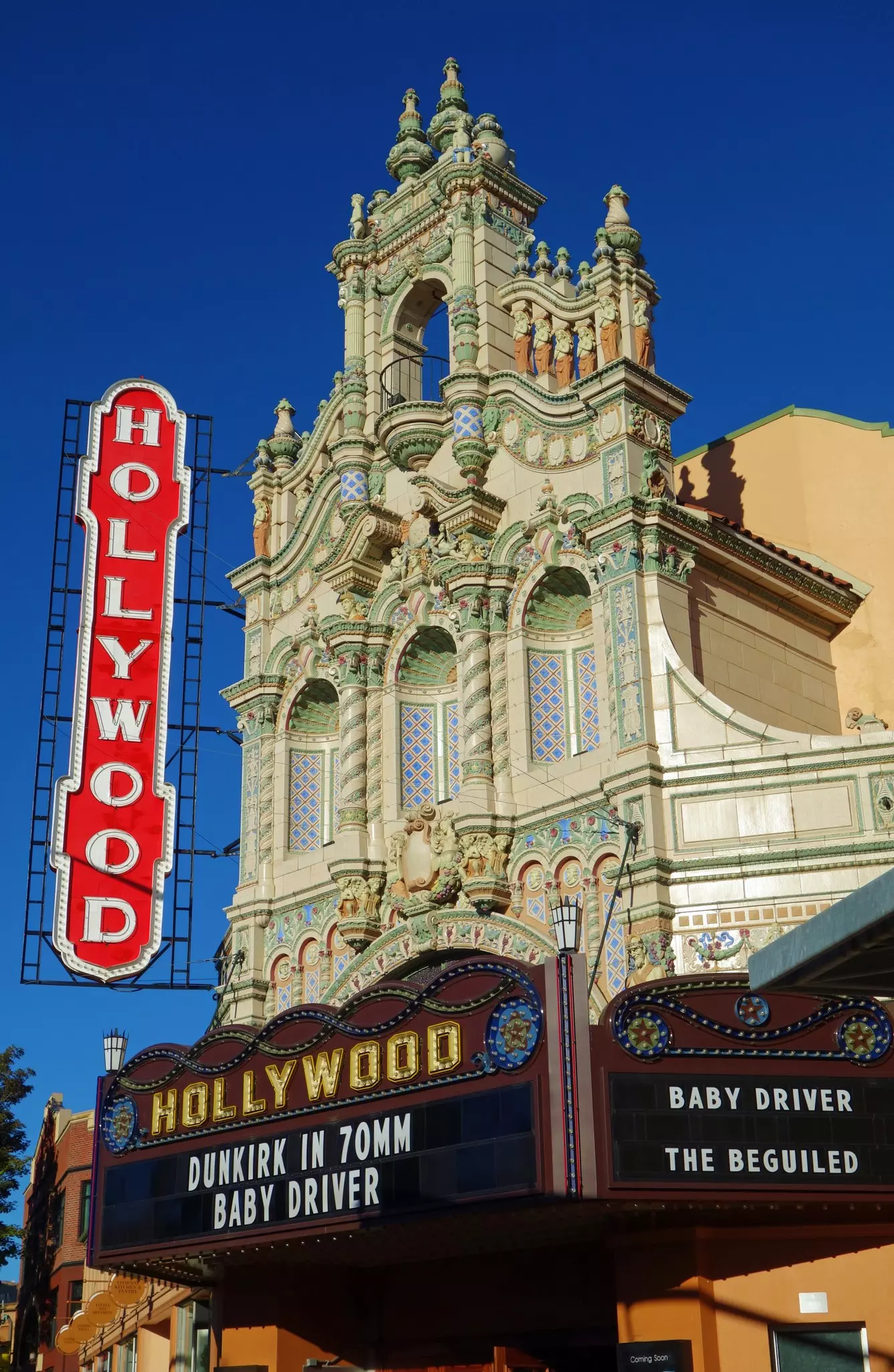 View of the facade and sign of the landmark Hollywood theater, showing the movie Dunkirk, in Portland, Oregon. The theater is  on the National Register of Historic Places. 
