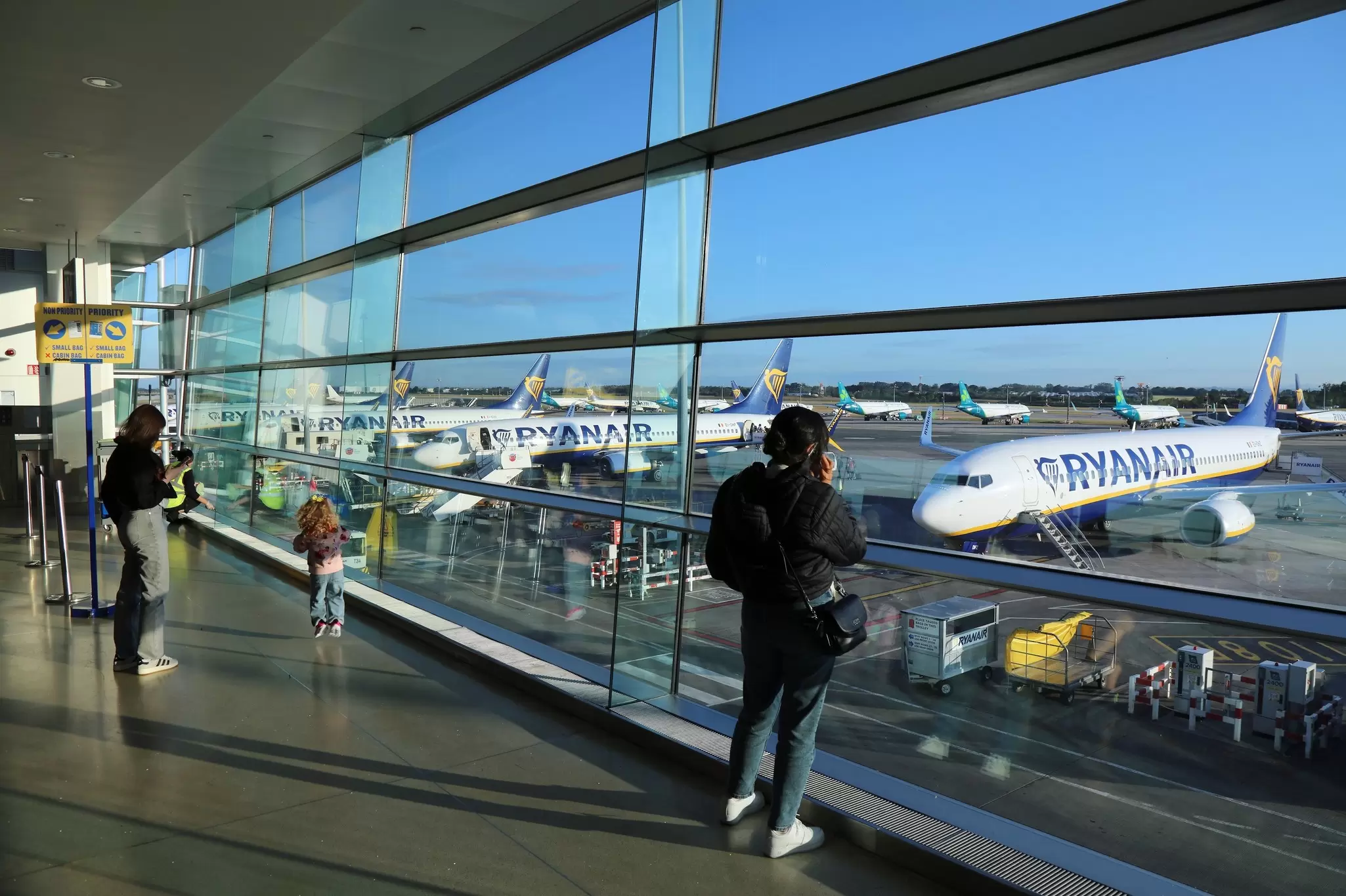 A view from the terminal of Ryanair planes lined up at Dublin Airport, Ireland. 