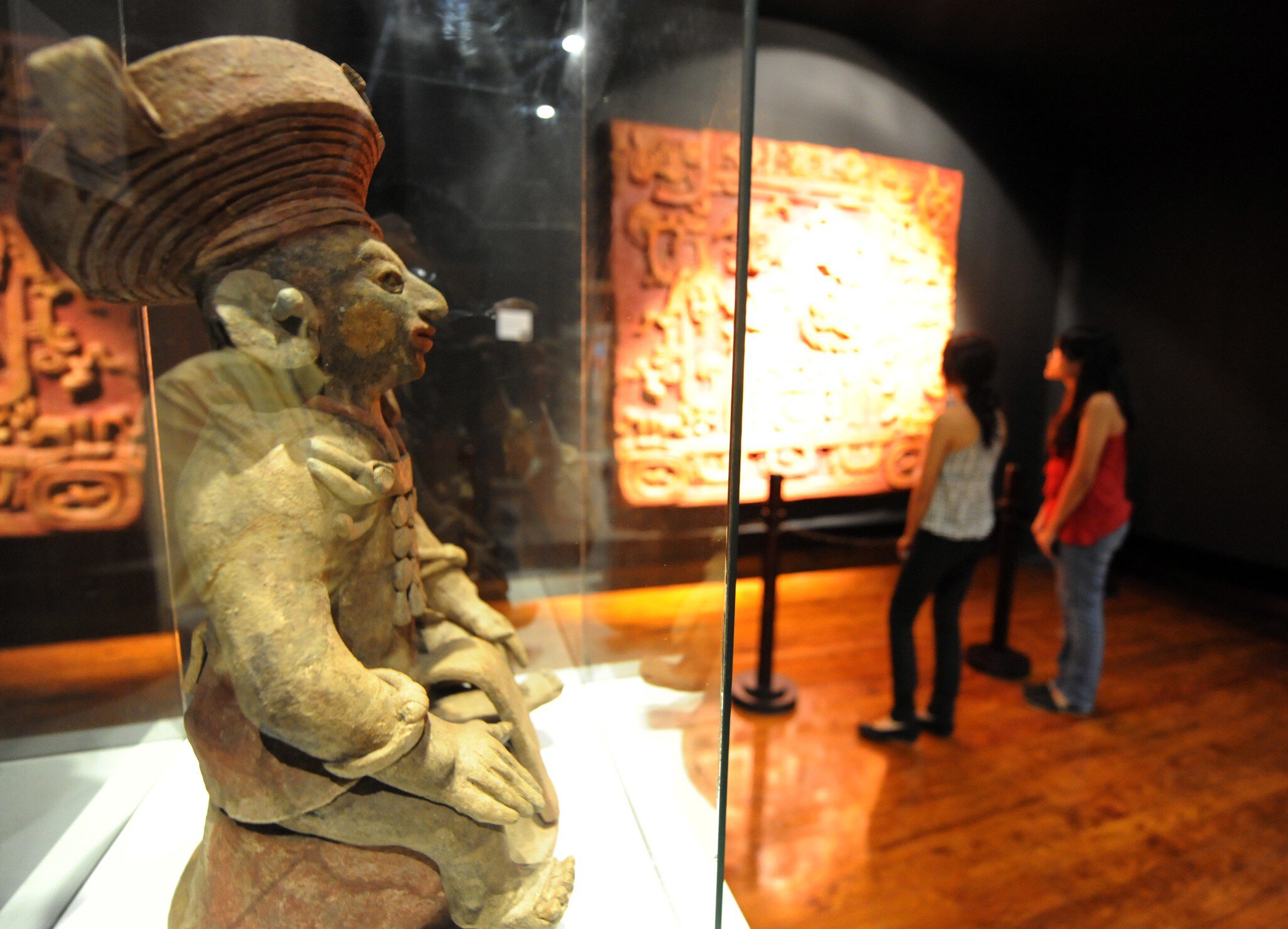 Visitors learn about the Mayas at the Museum of National Identity in Tegucigalpa on December 14, 2012. The beginning of a new Mayan era on December 21 will be marked with celebrations throughout southern Mexico and Central America. Honduras is one...