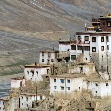 Aerial view on Ki Gompa, a Tibetan Buddhist monastery located on top of a hill at an altitude of 4,166 metres, the Spiti Valley in the background. Himachal Pradesh, India.