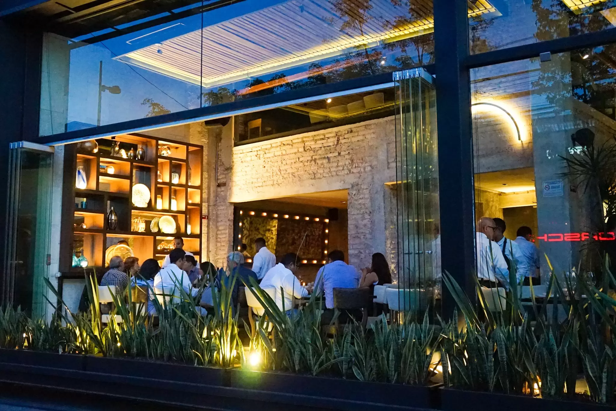 Open window of an upscale restaurant in Polanco in Mexico City, Mexico. Inspired By Maps/Shutterstock